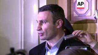 Opposition leader Klitschko and protesters react after PM resigns and govt offers more concessions [upl. by Friedman]