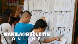 Mandaluyong voters find their names posted on the official voters list for BSKE [upl. by Daloris817]