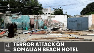 Suicide bomber kills at least 32 people at beach hotel in Somalia [upl. by Ahsiruam775]