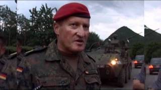 Nato troops retreat from Kosovo Serbs [upl. by Ahselat]