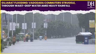 Gujarat floods Incessant rainfall hampers life Vadodara commuters wade through waistdeep water [upl. by Anileme]