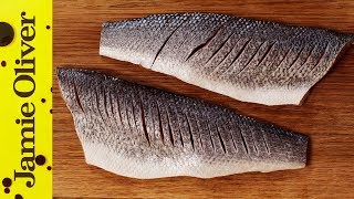 How to Fillet a Seabass  Jamie Oliver [upl. by Dewees]