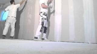 Spray plastering drywall last coat [upl. by Parry658]