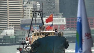 Hong Kong welcomes proChina island activists home [upl. by Aronoel]