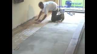 Installing Solid Oak Floor onto concrete with Rewmar MS Polymer Flexible Adhesive [upl. by Nakashima]