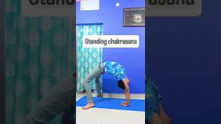 Standing chakrasana fitness trainathome trainanytime onlineyogatraining [upl. by Igiul]