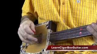 Hybrid Picking on a cigar box guitar [upl. by Tudela]