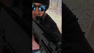 Running a beltfed 556 fightlite beltfed binarytrigger shooting [upl. by Hoopen]