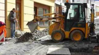 Backhoe JCB 1CX in the city [upl. by Notniw427]