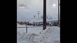 Scary Video Train Smashes into Semi on Tracks in Snow [upl. by Atinuahs]