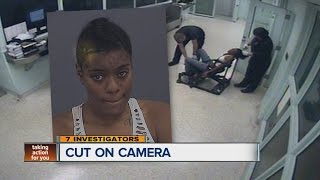 Warren police officer cuts off Detroit mothers sewnon hair weave [upl. by Garlan]