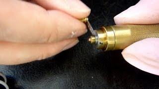 How to fit a watch mainspring into the barrel using Bergeon winders Watch repairing techniques [upl. by Billy]