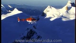 Chopper flying over the snowcapped mountains of Himalayan Range [upl. by Einahpet572]