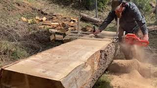 Chainsaw milling on a Granberg Alaskan mill with Husqvarna 395XP chainsaw sawmill logging [upl. by Eberto]