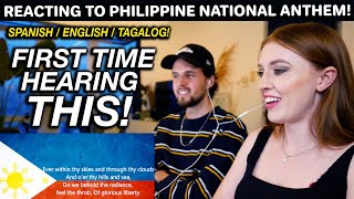 Reacting to PHILIPPINES NATIONAL ANTHEM Our First Time Hearing This [upl. by Doley]