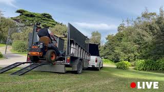 Unloading  loading a zero turn mower onto a trailer with a K9 twist [upl. by Bradwell]