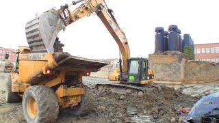 Cat 324D Loading Hydrema 912 Dumpers [upl. by Suilenrac]