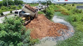 Full Video Technique filling Flooded land Next to the road Use Dozer MITSUBISHI amp Small Dump Truck [upl. by Elson]