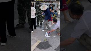 Chinese man cleaning shoes [upl. by Mclaughlin]