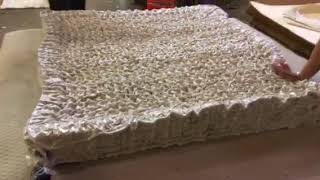 How to roll pocket coil mattress [upl. by Joyan986]