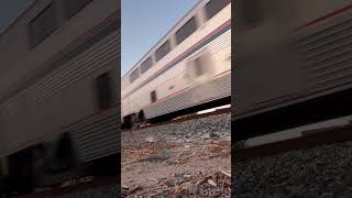 Southbound Amtrak train 11 passing through Oxnard with 318 leading railfanner amtrak oxnard [upl. by Arocahs]