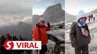 Rare snow phenomenon at Mt Kinabalu a pleasant surprise for climbers guides [upl. by Hasila529]