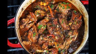 The Ultimate Jamaican Brown Stew Chicken  CaribbeanPotcom [upl. by Ellemaj864]