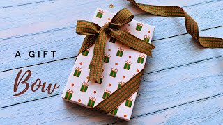 How to tie diagonal Ribbon Bow on Gift Box  Christmas Ribbon Gift wrap easy giftwrap [upl. by Mcneely]