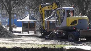 Wacker neuson 9503 2 Wheeled Excavator loading truck [upl. by Enitsenrae]