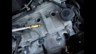 Cylinder compression test demo on 2002 Mazda Protege [upl. by Adnahc259]