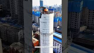 The demolition site of the chimney in a thermal power plant Highaltitude work Excavator [upl. by Anailuj]