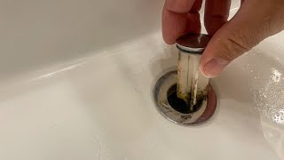 How to Remove a Bathroom Sink Pop Up Stopper [upl. by Armand]