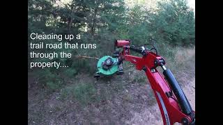 PUSH MOWER CONVERTED TO BACKHOE BRUSH CUTTER [upl. by Inatsed]