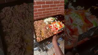 Unc Teaching Nephew the Two handed Spatula trick when cooking Fajitas on a Blackstone Grill [upl. by Blount]