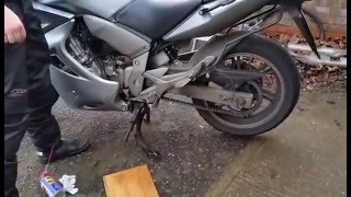 Honda CBF1000 swapping exhausts [upl. by Adao289]