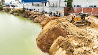 Komatsu Bulldozer Pushing Soil Filling Into Water With 25T Dump Trucks [upl. by Riedel]