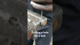 Drilling a hole on a bolt machining lathe drilling lathemachine mechanical [upl. by Anauqaj]