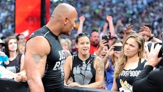 The Rock and Ronda Rousey make surprise appearance at WrestleMania 31Watch Video [upl. by Nyleda486]