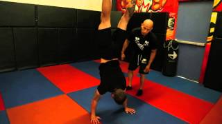 How To Perform A Handstand with Frank Medrano at Metroflex LBC [upl. by Ihcehcu]