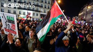 Protesters march in Paris against proIsrael gala ahead of tense soccer match [upl. by Ehctav]