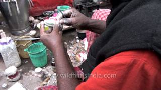 Denture being prepared by roadside dentist Varanasi [upl. by Enomyar841]