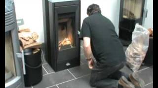 Lighting a Rika Vitra woodburning stove [upl. by Doughman350]