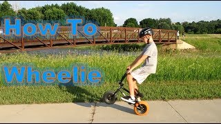 HOW TO WHEELIE A MINI BMX BIKE [upl. by Crichton]