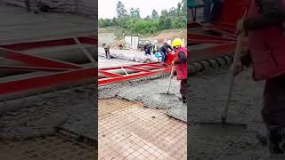 Concrete paving process with the road roller [upl. by Anaeerb422]