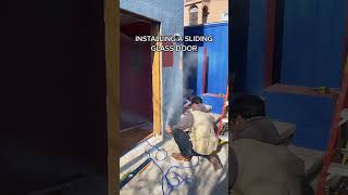 Installing a Sliding Glass Door  Sliding Patio Door Installation  Glass Sliding Door shorts [upl. by Nairrad622]