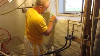 Applying BASF Thoroseal concrete based coating to waterproof basement walls [upl. by Issak]