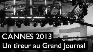 CANNES 2013  Un déséquilibré tire devant le plateau du Grand Journal de Canal Plus [upl. by Noimad]