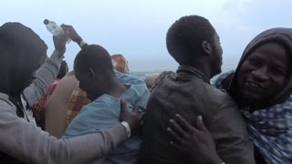 324 West Africa migrants rescued off Italy coast [upl. by Dominy]