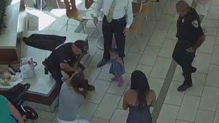 Surveillance video shows 2 officers saving choking baby [upl. by Bouzoun335]