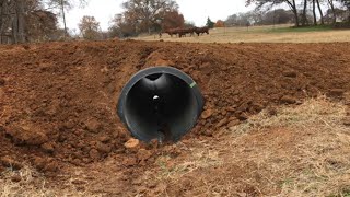 INSTALLING A 20FOOT CULVERT PIPE  BRIDGING THE CREEK [upl. by Tuppeny457]